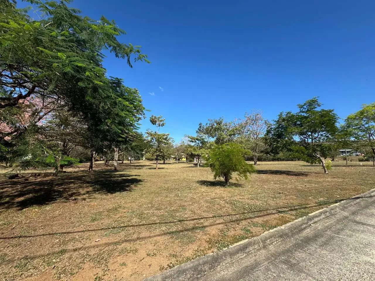 Building lot with paved road access in a residential area of Playa Potrero